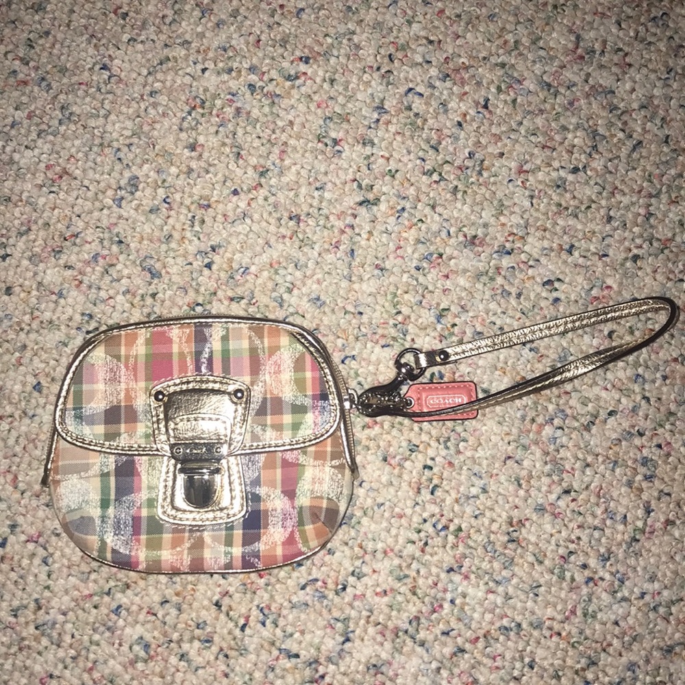 Badly used Coach wristband purse.